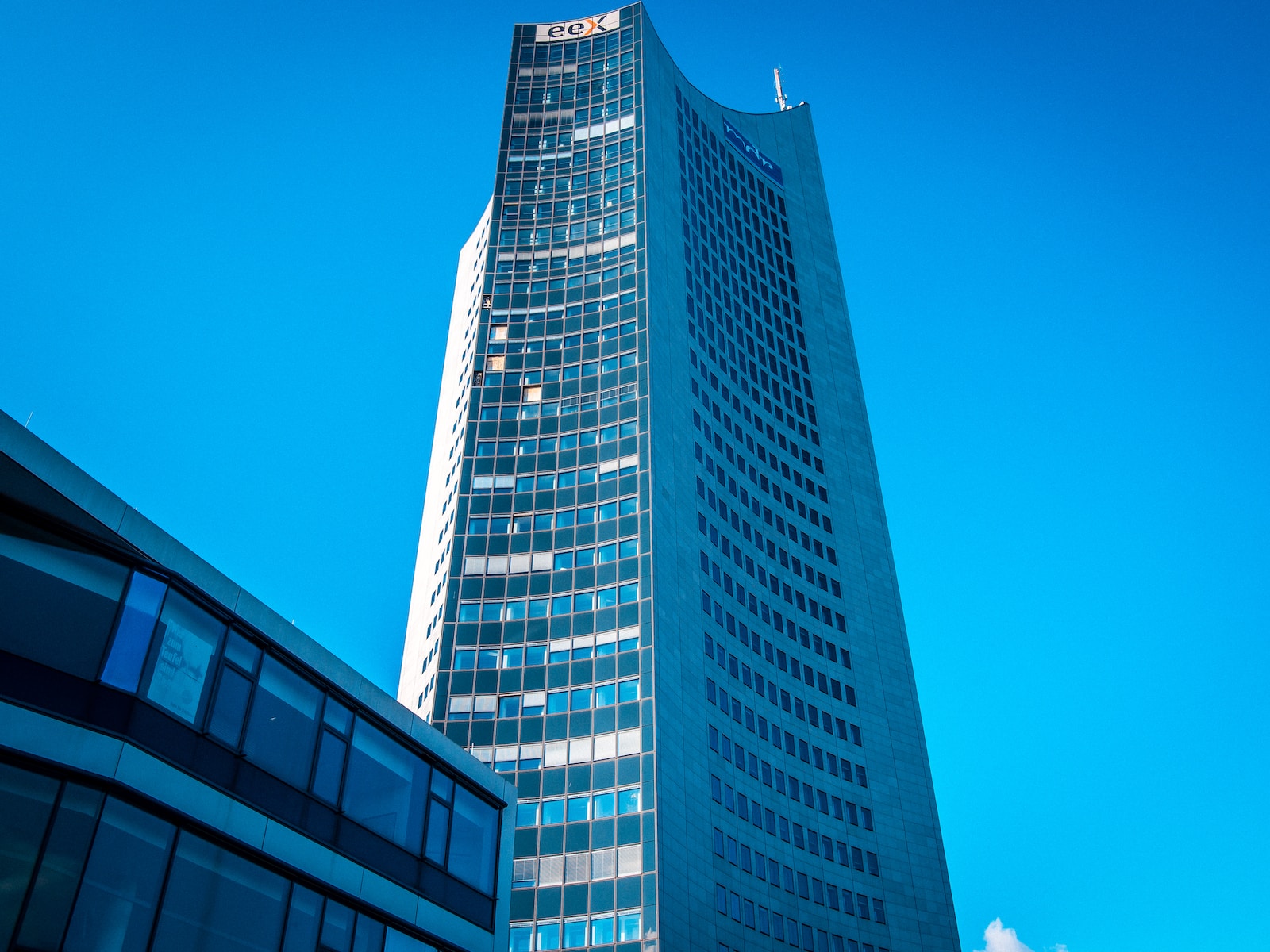 gray concrete building under blue sky during daytime